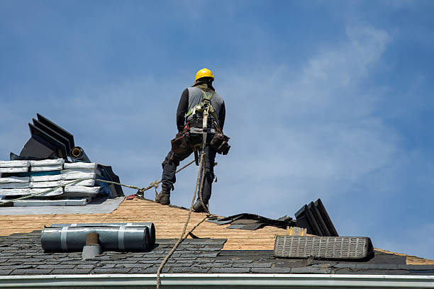 Professional Roof Replacement technician working in Three Bridges, NJ